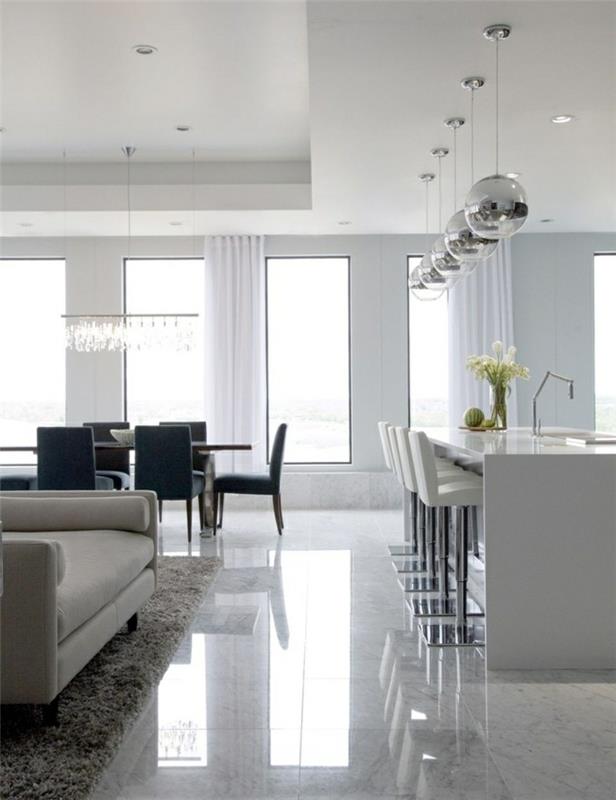 0-lepa-dnevna soba-s-sijočimi-sivimi ploščicami-moderna-dnevna soba-rjava preproga-kuhinja-bar-beli-barski stoli