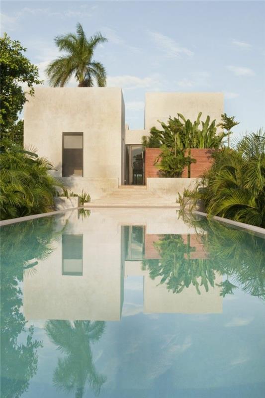 1-priimti-minimalistinio stiliaus-in-the-architektūra-of-the-modern-house-with-pool