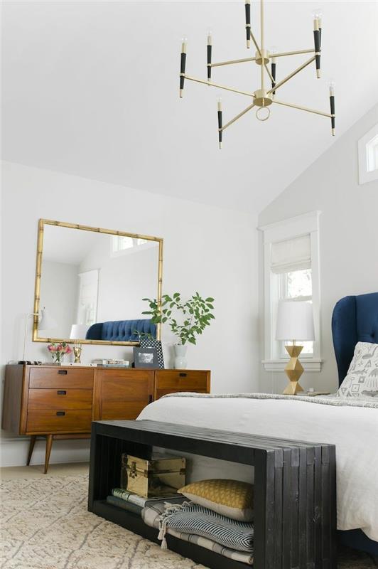 Modern yatak odalı beyaz duvarlar içinde siyah ahşap ve dekorasyonlu 1-yatak sonu-göğüs