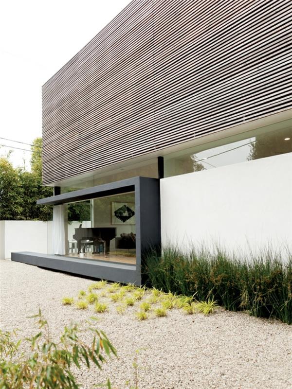 1-gražiausias-prabangus namas minimalistinio stiliaus su dekoratyviniu akmeniniu sodu