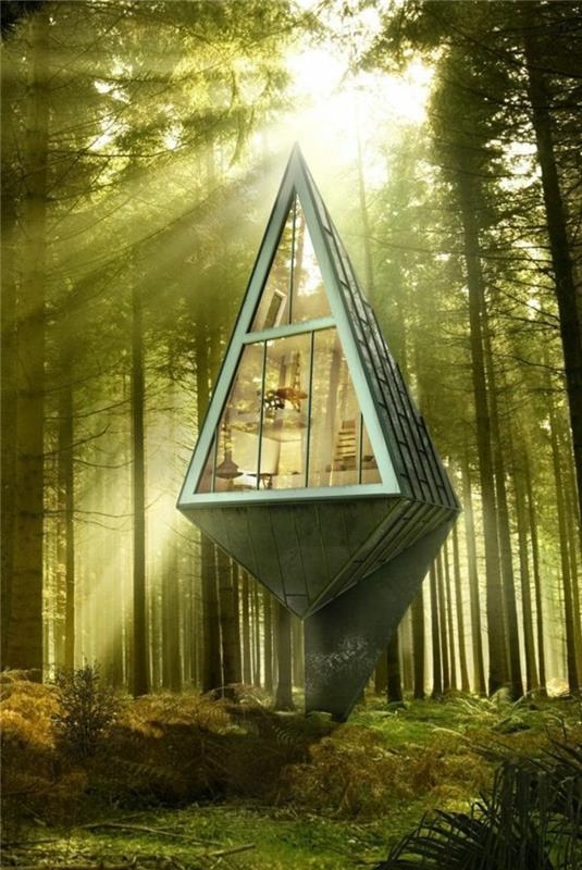 1 minimalizmas architektūroje-gana šiuolaikiškas namas miške, esančiame medžiuose