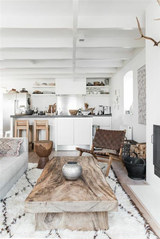 1-skandinaviški baldai-rūmai-skandinaviški baldai-baltas kilimas-medinis stalas-svetainėje