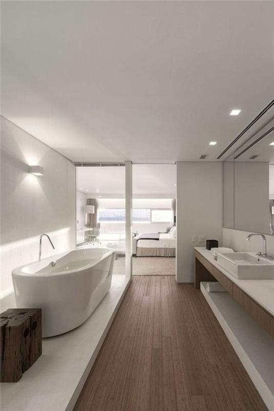 1 prabangus dizainerio vonios kambarys-baltos sienos-vonia-balta-parketo grindys