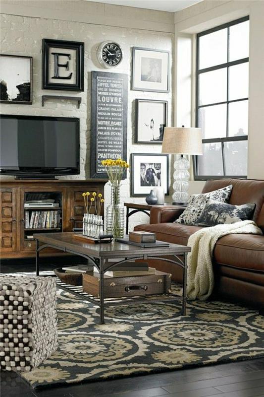2-svetainė-lempa-tamsiai rudos odos-spalvotas kilimas-moderniame-gyvenamajame kambaryje-gėlės ant stalo