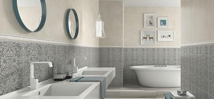 vonios kambario dekoras-baltai ir pilkai-idėja-vonios kambario plytelių klojimas-estetinė-dvi kriauklės-graži-sienų dekoracija-laisvai stovinti vonia