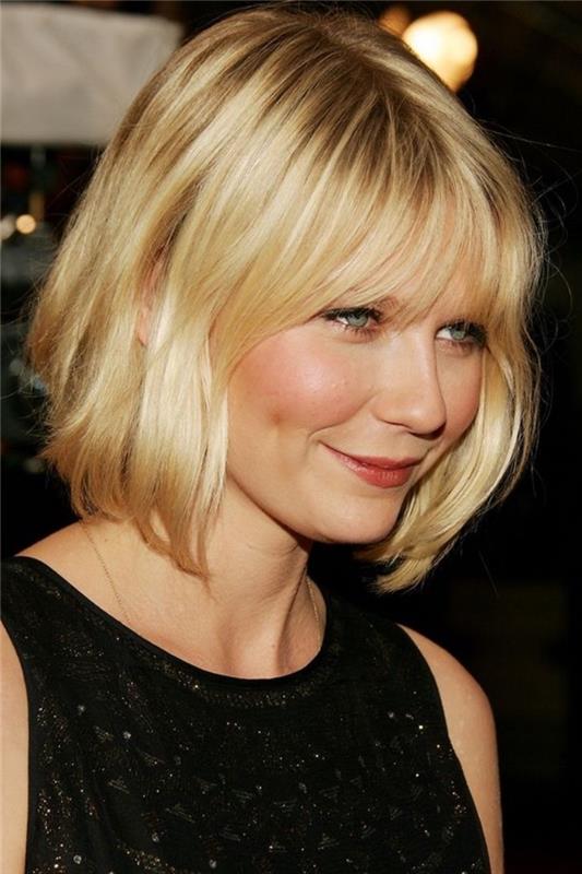 Kirsten Dunst v svojem bob kroju, daljših šiškah in sprednjih ključavnicah, blond lase