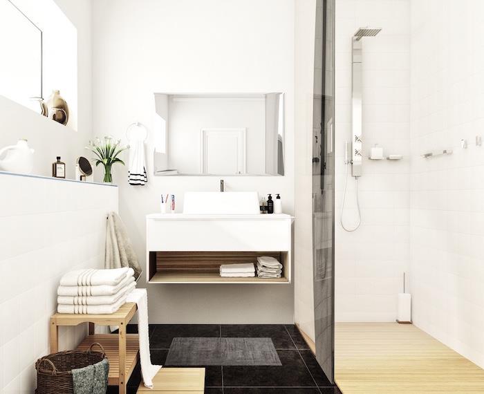 Bela kopalnica v skandinavskem slogu z italijansko prho s parketom in črnimi ploščicami ter oblikovalskim visečim umivalnikom