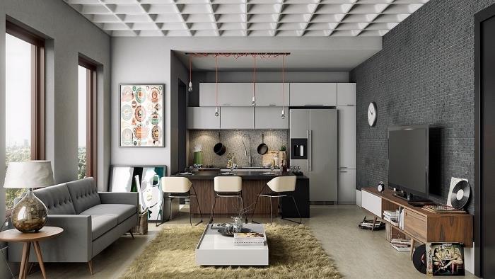 gri taş duvarlı ve bej zeminli beyaz duvarlı oturma odası, beyaz mobilyalı hazır mutfak modeli