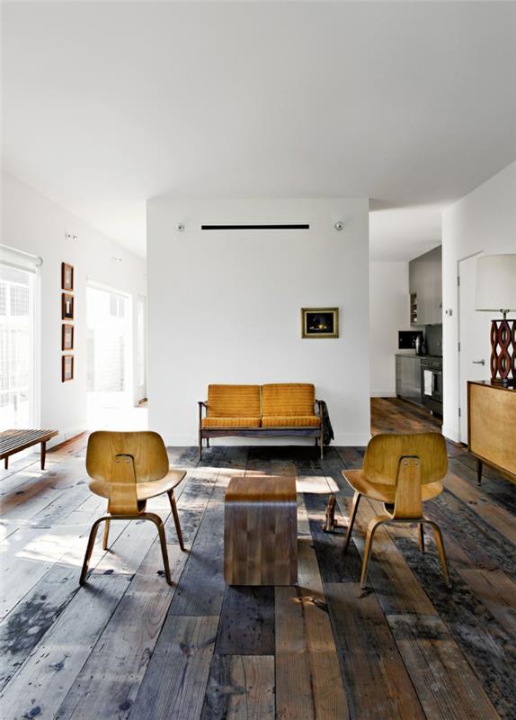 vintage tarzı bir oturma odasında oluşturulan sarı hardal sarısı ve ahşabın uyumlu kombinasyonu