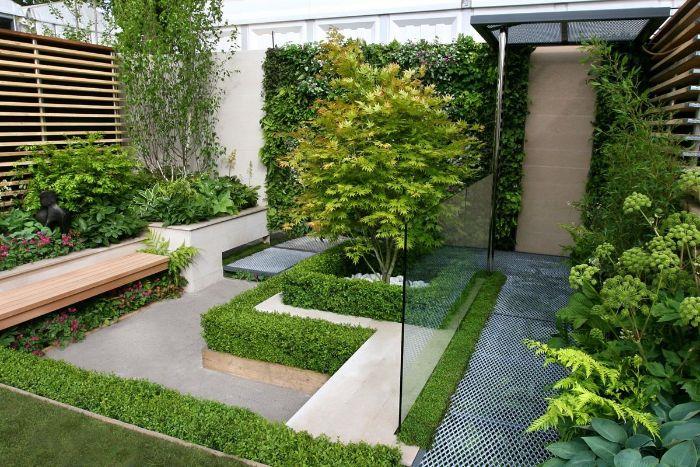 urejanje zunanje zelene stene z obrobami šimpuša in dreves bršljana ter betonske steze zunanje urejanje vrta