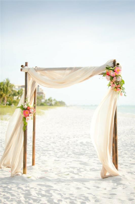 Bir düğün için bir kemer nasıl yapılır, deniz kenarında bir düğün kemeri için çiçekler süslenir