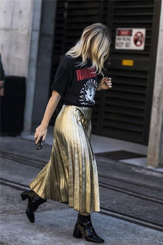 80-ųjų stiliaus drabužių ilgas klostuotas sijonas su auksiniais atspalviais ir juodais roko marškinėliais