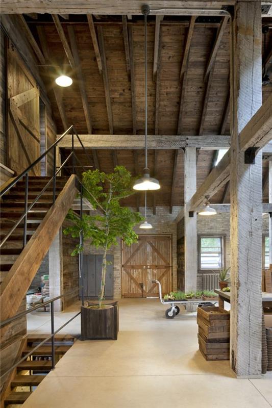 stanovanje v slogu podstrešja z rastlinami iz masivnega lesa in v zaprtih prostorih