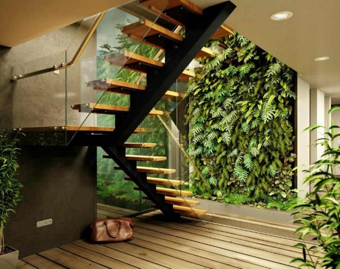didelė žalia siena, žalia plokštė šiuolaikinio namo viduje, pramoniniai laiptai