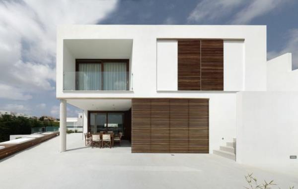 minimalistinės architektūros kubistinis-dėžinis namas