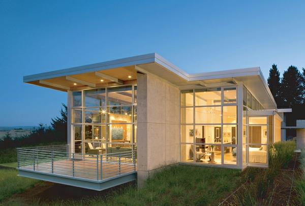 minimalistinės architektūros graikinių riešutų namų dizainas, kurį sukūrė architektai
