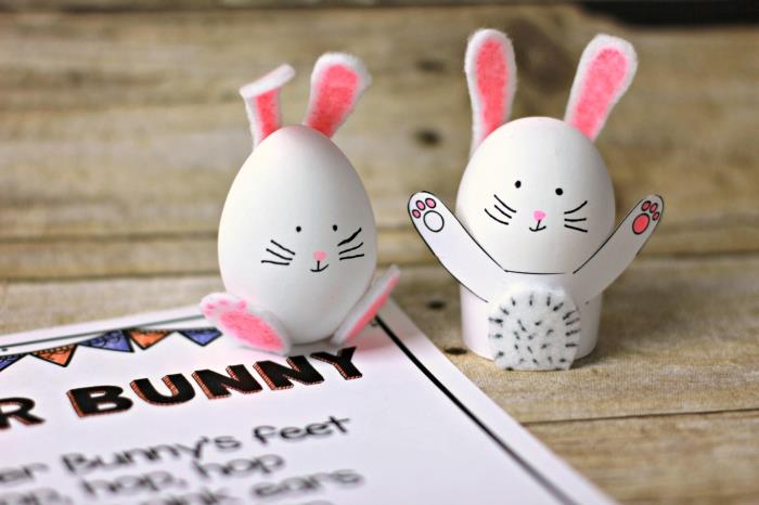 kağıt ve kumaş ile beyaz kabuklu yumurtalar, beyaz ve pembe tavşan şeklindeki yumurtalar nasıl süslenir