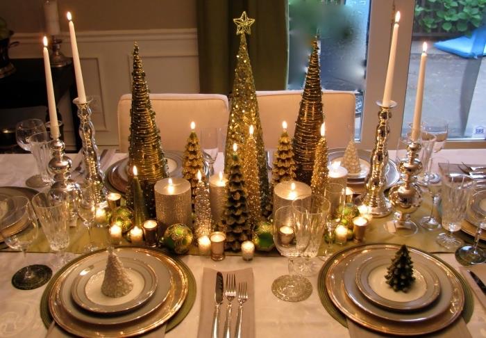 idėja, kaip papuošti namus Kalėdų proga, pasidaryk pats stalo dekoravimas įvairaus dydžio medžio figūrėlėmis ir žvakėmis