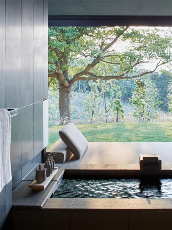 „Zen“ vonios kambarys su vonia, kokiomis spalvomis papuošti japoniško stiliaus vonios kambarį ir „Zen“ gamtą