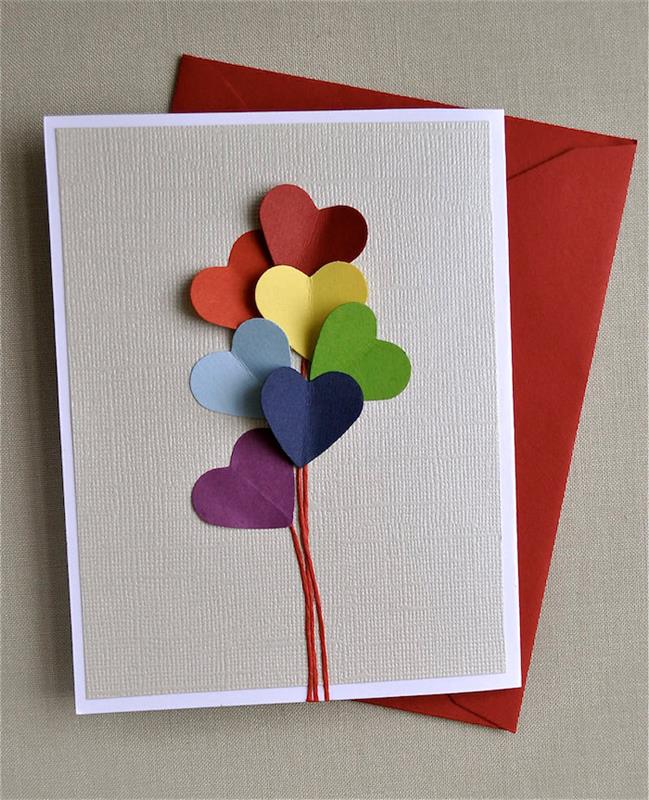 širdies formos balionai iš spalvoto popieriaus pilkame fone paprasta vaikų darželio Tėvo dienos dovanos idėja