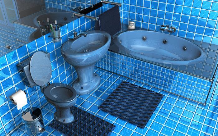 ideje za majhno kopalnico, kopalnica z modrimi ploščicami na tleh in stenah, ki vsebuje modro kad, modro straniščno školjko in umivalnik, veliko stensko ogledalo