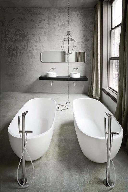 Zeminde çimento sıvalı mumlu beton model banyo ve iki bağımsız küvetli duvarlar