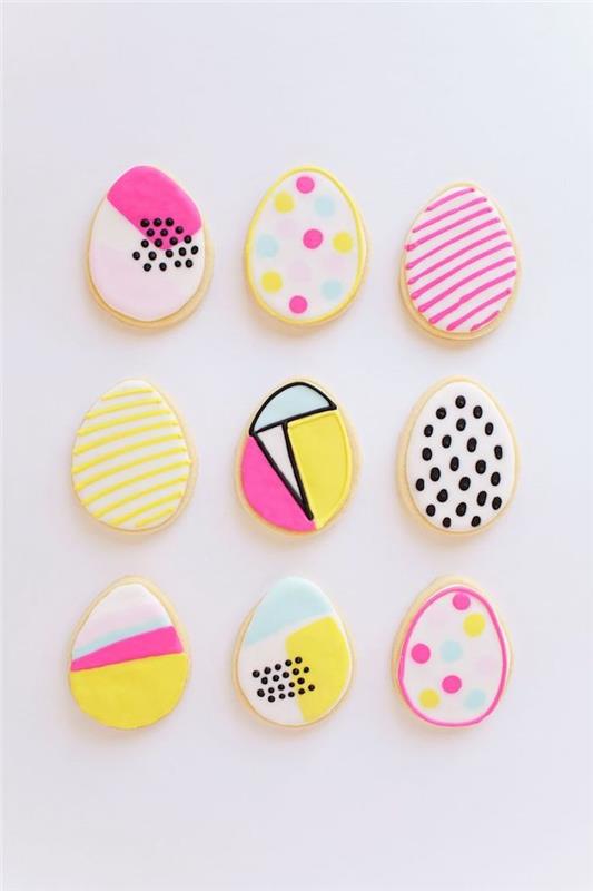 Gražiai dekoruoti sausainiai su spalvinga cukraus tešla šiuolaikinėmis neoninėmis spalvomis, linksmų Velykų atvirukas, gražus linksmų Velykų vaizdas