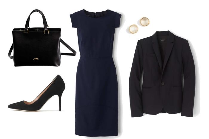 primer profesionalne ženske obleke s temno modro obleko do kolena in črnim blazerjem v kombinaciji s temnimi čevlji in torbico