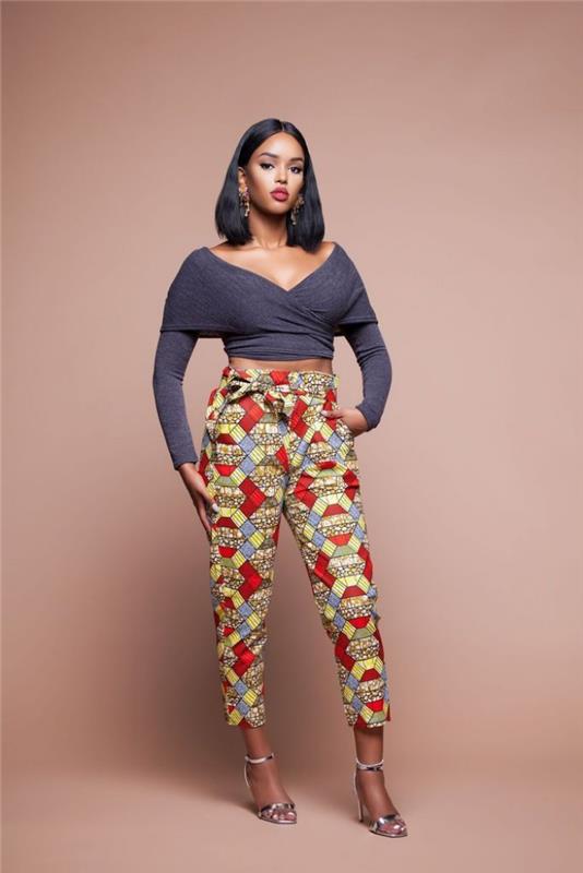 primer tekočih hlač v afriškem slogu iz etnične tkanine z geometrijskimi vzorci, primer obleke s hlačami in dekoltiranim krojem