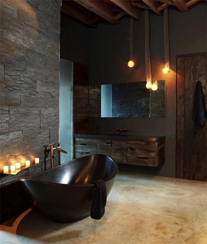 kako okrasiti kopalnico brez oken za sproščujoče vzdušje, sivo kamnito steno in pohištvo iz temnega masivnega lesa