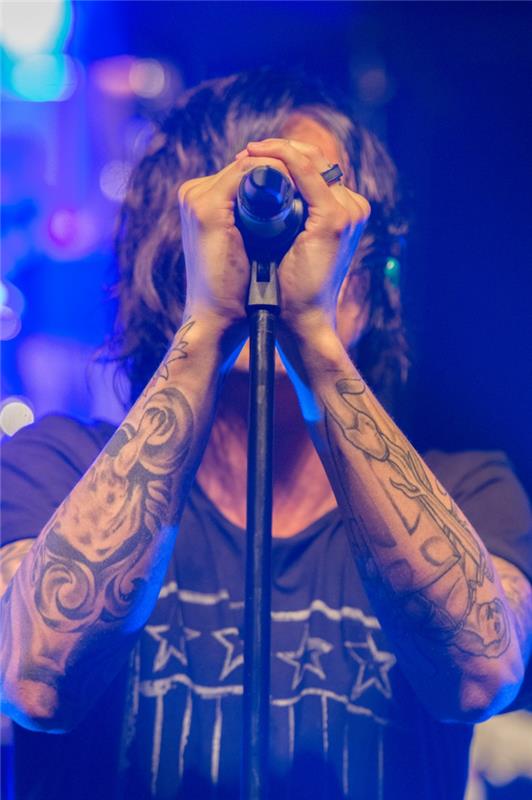 Kaip pasirinkti savo tatuiruotės dizaino vikingų istorijos dainininko tatuiruotės idėją