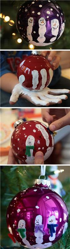 Kalėdinė puošmena suaugusiems, raudoni ir fuksijos kamuoliukai, dekoruoti balta spalva nupiešta ranka, kiekvienas pirštas yra sniego senis, nupieštas sniegas