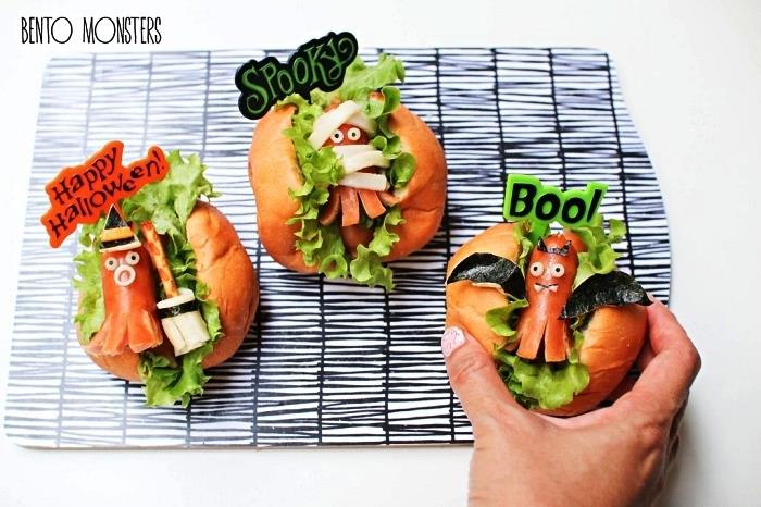 cadılar bayramı atıştırmalıkları için kolay tarif, yeşil salata ve ahtapot sosisi ile cadılar bayramı özel ev yapımı hamburgerler