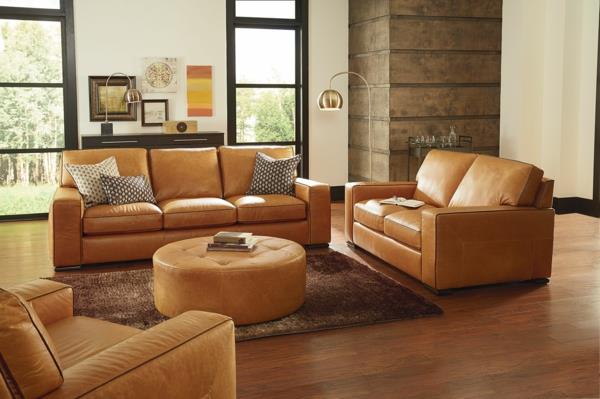 natuzzi-sofa-ruda-odinė-sofos-grindų lempos-arkos ir apvali oda-ottomanas