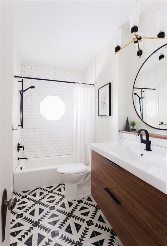 modernus skandinaviško stiliaus vonios kambarys su stipriu akcentu ant juodai baltų cementinių plytelių grindų su etniniais navajo raštais