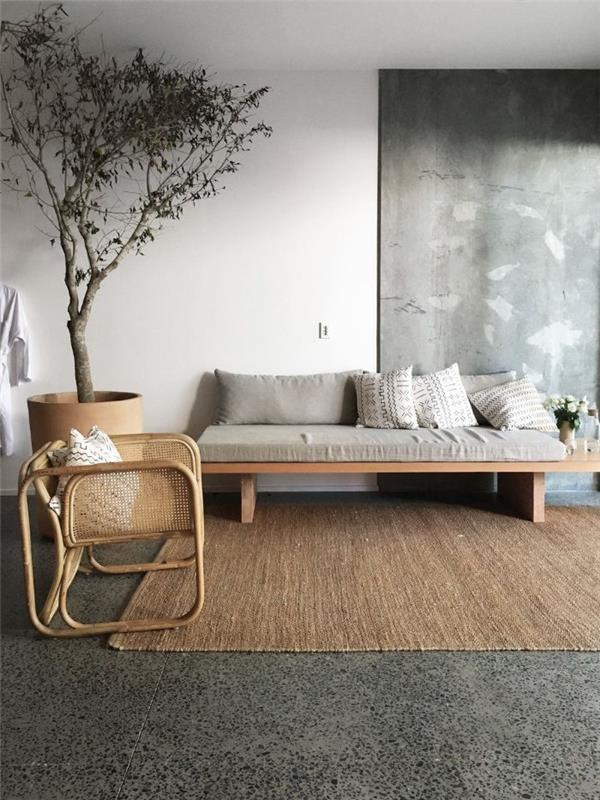 gri yer karoları beton etkisi beton duvar masa beton imitasyon ahşap kanepe ve baston sandalyeler jüt halı çağdaş oturma odası dekoru