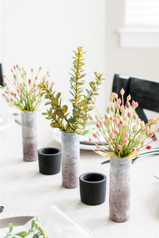 ideje za dekoracijo mize, cementne vaze, šopek sukulentov, šopki rož, črni svečniki