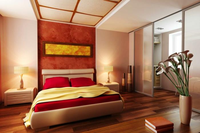 bež postelja na platformi, preprosta, a elegantna dekoracija spalnice v stilu Zen