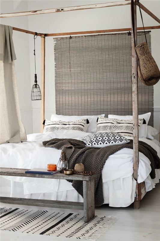 nötr tonlarda etnik şık bir yatak odası, Afrika esintili sayvanlı yatak