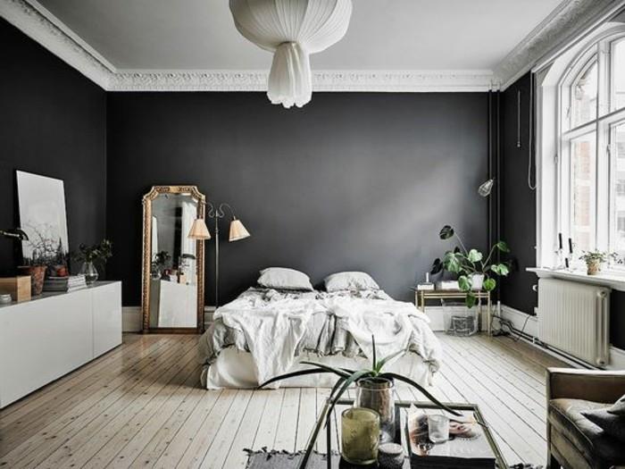 odrasla-spalnica-popolna-antracit-sivo-stene-deske-tla-črne-stene-belo-pohištvo