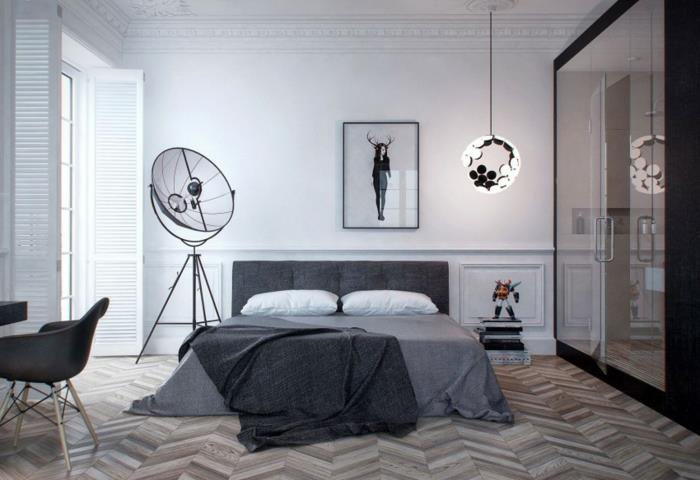 „Chevron“ grindys šiuolaikiškame suaugusiųjų miegamajame, ekstravagantiškas paveikslas, moderni drabužių spinta, mažas plaukiojantis stalas