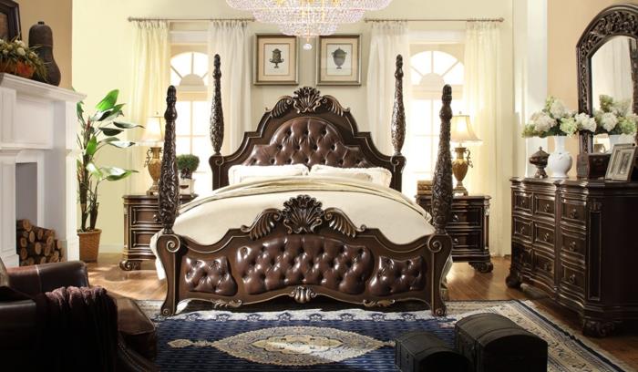 barok yatak odası, koyu ahşap karyola, mavi halı, bej duvarlar, beyaz dekoratif şömine