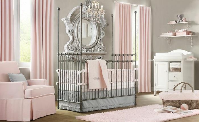 kūdikių kambarys visiškai pigus, švelniai rožinis kilimas, pilka kūdikio lova, rožinis buferis