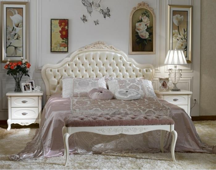 modern lüks yatak odası, büyük yastıklı yatak başı, beyaz komidinler, duvar resimleri