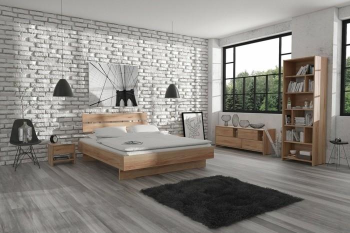 Skandinaviško-urbanistinio stiliaus miegamasis-skandinaviško medžio-lovos-biblioteka-skandinaviškas-žemas bufetas-balta-plytų siena-pilka-kiliminė danga-juoda ir balta