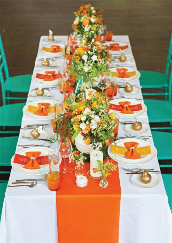 stalo bėgikai-apelsinų-stalo-dekoracijos-gėlės-balta-staltiesė