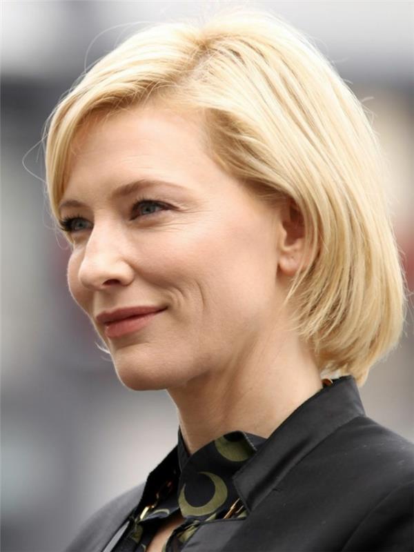 Cate Blanchett kvadratinių plaukų šukuosena, šoniniai kirpčiukai, paprastas makiažas