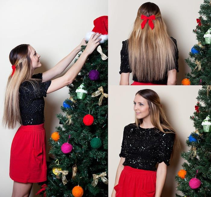 primer enostavne božične pričeske dolgi lasje, sprednji prameni potegnjeni nazaj in oprijeti z rdečim lokom, črno -rdečo obleko, okrašeno božično drevo
