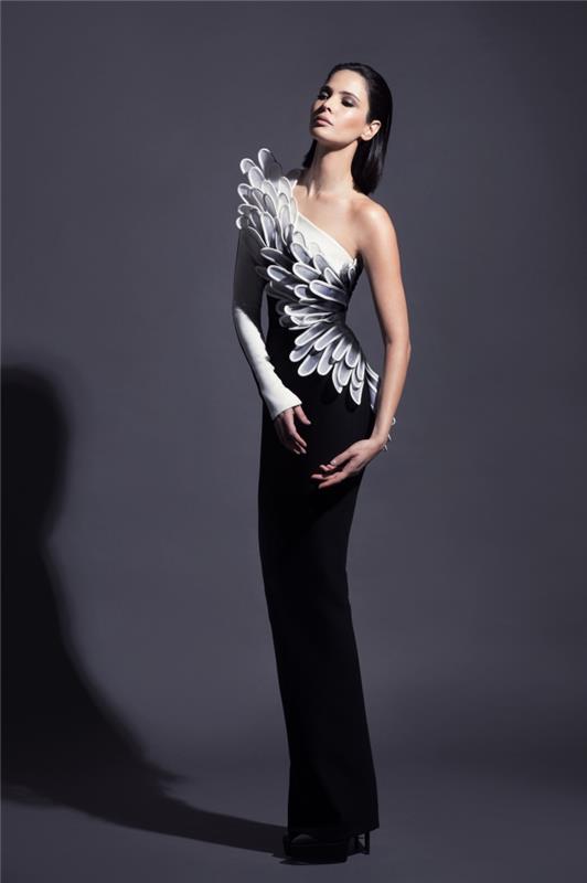 Uzun kollu 3d yaprak desenli siyah etek ve beyaz üstte resmi uzun elbisenin haute couture tasarımı