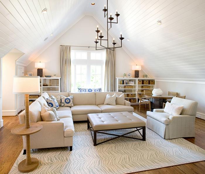 beyaz ve çok şık oturma odası, köşe kanepe, modern koltuk, siyah tavan lambası, eğimli tavan